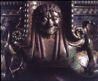grimacing Gorgon cast in bronze