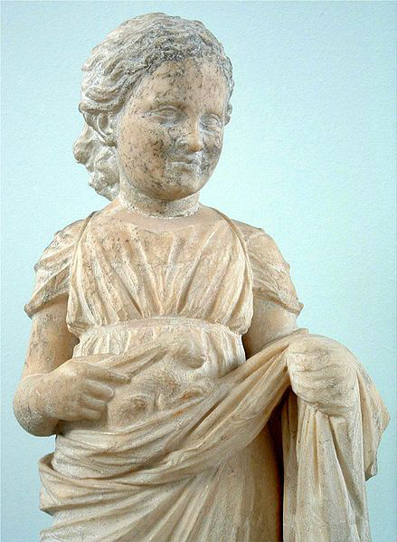 marble sculpture of eight year old girl holding rabbit in the folds of her robe