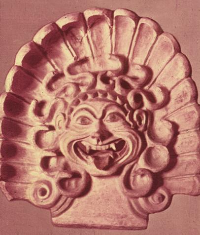 gorgon face within shell frame