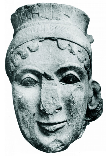 limestone head of goddess with feathered crown