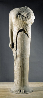 pillar goddess carved in severe abstract style