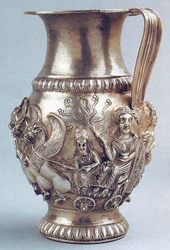 another chased silver ewer