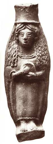 clay woman holding a hand drum