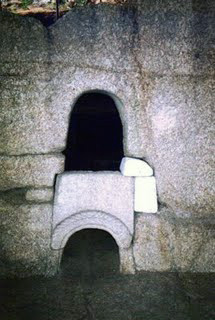 a double portal reconstructed from iron age sauna stones