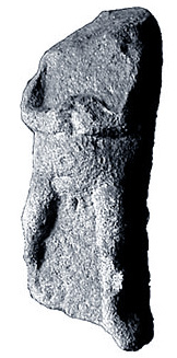 nude statue of rough stone, woman with hands to center and marked vulva