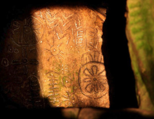 Backstone of Cairn T receives sunlight at dawn on spring equinox