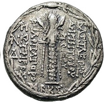 silver coin with crowned goddess