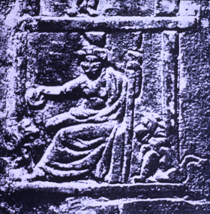 relief of seated  goddess flanked by lions