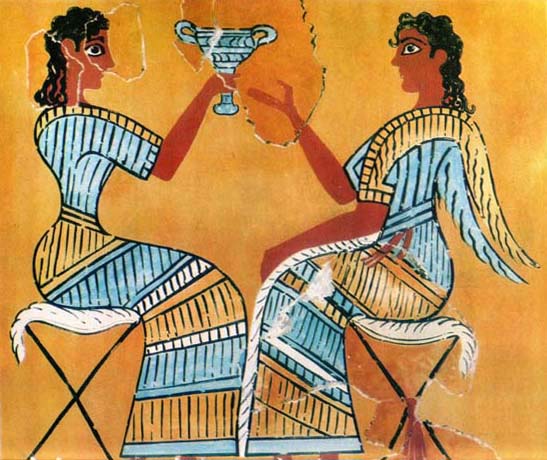 two women sharing a drink