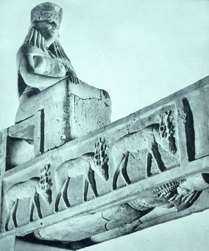 seated goddess with animals