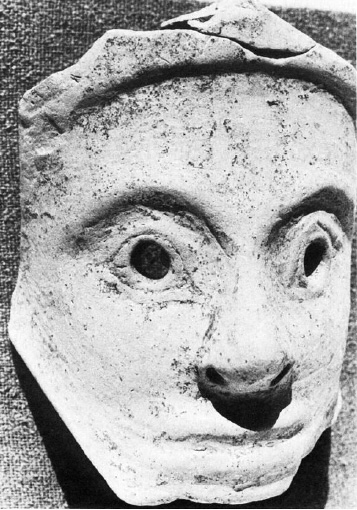 ceramic mask of young woman