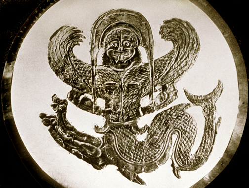 chased metal gorgon with lion legs, serpent-fish-tail, and wings