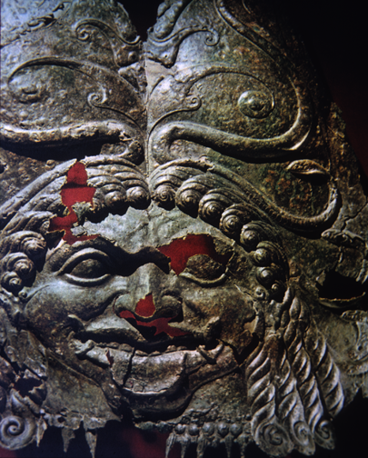 bronze corselet armor with gorgon head at center of chest