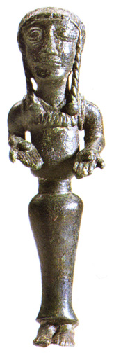 woman with braids and small round offerings in each hand