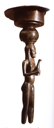 nude woman holding bird with large bowl atop her head