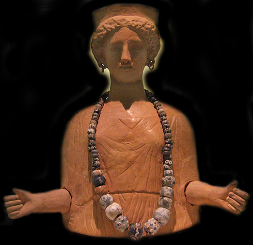 terracotta statue of goddess with outsretched arms